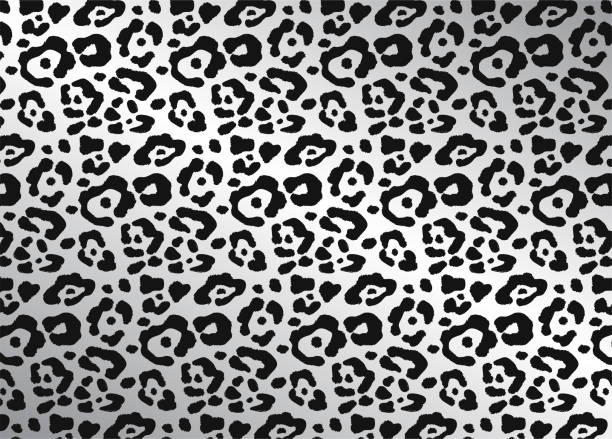 Full frame black and white animal print pattern Full frame black and white animal print pattern for use as a design element, vector illustration black and white cheetah print stock illustrations
