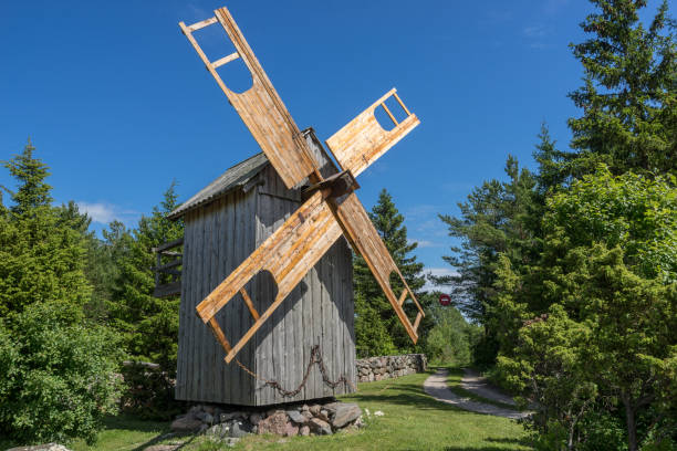 istock Grain mill on the summer landscape. Windmill and natural background pattern. Hiiumaa, small island in Estonia. Europe 1197659089