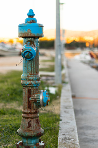 Rusted blue fire hydrant