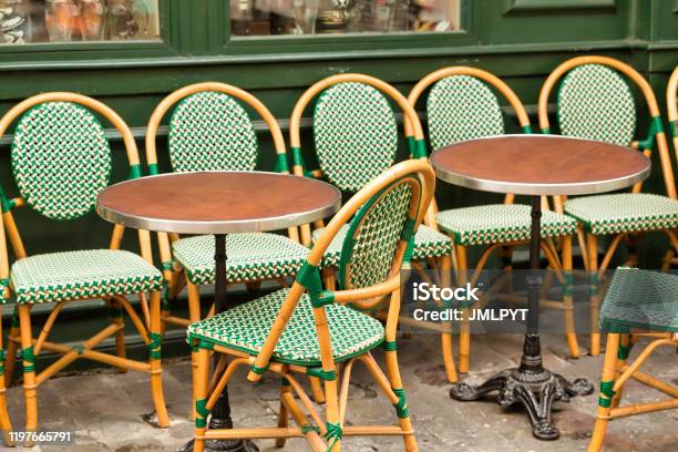 Typical Outdoor Cafe In Paris In Butte Montmartre Stock Photo - Download Image Now - Sidewalk Cafe, Chair, Bar - Drink Establishment
