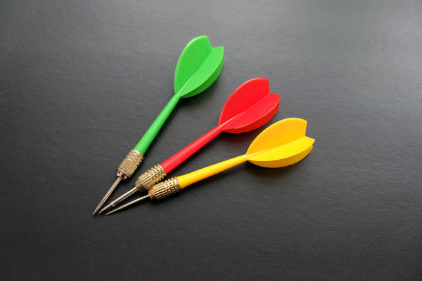 istock red, yellow, green dart arrows on black background, 1197666238
