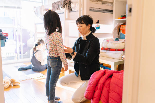 Working mother and daughters getting ready for the day