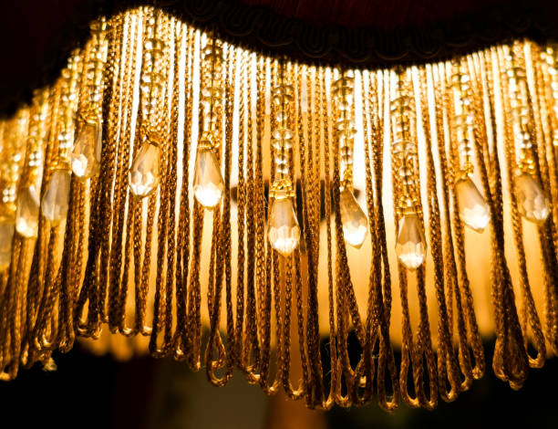 Illuminated retro style lamp on dark background
