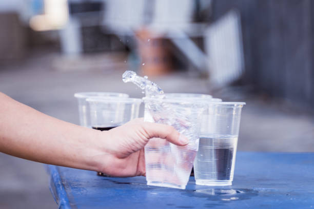 istock Hand is catching a glass of water. 1197671877