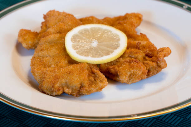 istock Viennese Schnitzel on an Elegant Plate with Lemon 1197672815
