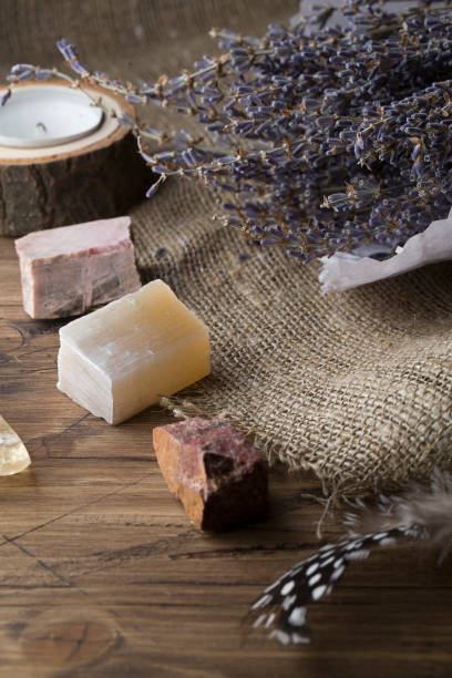 istock Divination with candle, lavender, stones. Halloween background, occult and esoteric objects 1197672942