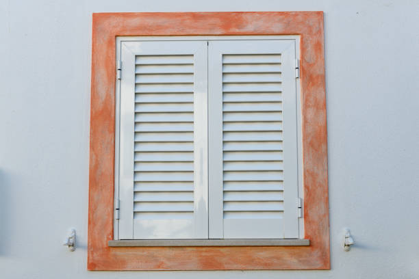 Closed wooden window shutters in Portugal