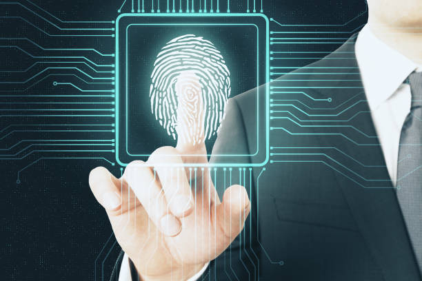 istock Digital protection concept with digital screen with microchip and fingerprint pushing by businessman. 1197677331