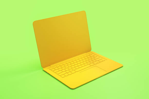 istock Minimal concept with onepiece single material yellow laptop at abstract light green background. 1197677907