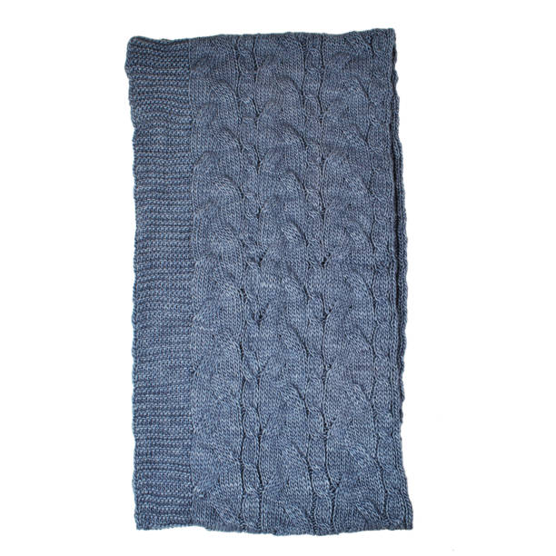 istock warm knitted scarf on a white background, isolated. 1197681027
