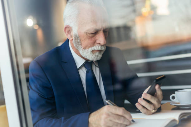 istock Senior businessman making a schedule 1197682240