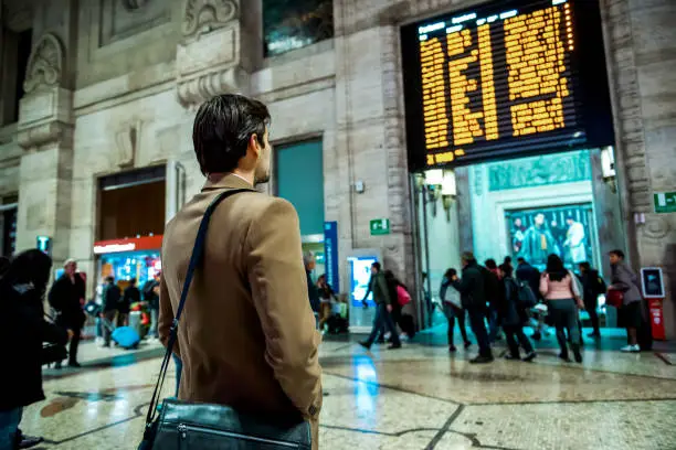 Photo of Young businessman at the train station