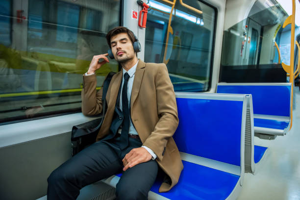 istock Businessman  traveling by train 1197683894