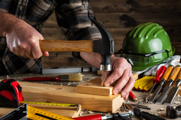 istock Carpenter at work on wooden boards. Carpentry. 1197685228
