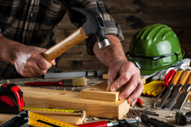 istock Carpenter at work on wooden boards. Carpentry. 1197685238