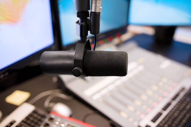 istock Microphone in modern radio station broadcasting studio 1197685810
