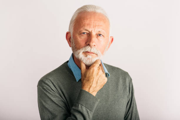 istock Serious senior portrait in studio 1197686097