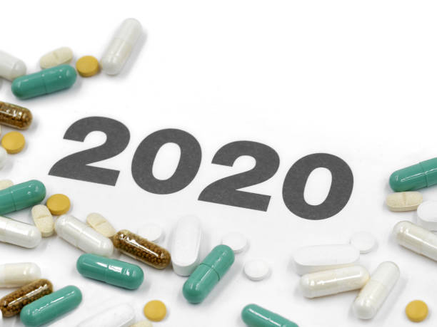 istock white calendar 2020 with various pills and copy space 1197689232