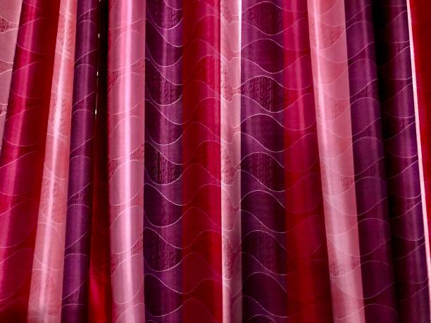 istock Red window’s curtain clothes with textures photo 1197690418