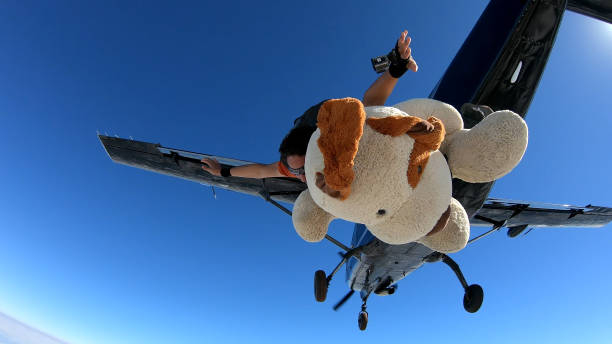 istock Skydiving Teddy Bear extreme sports 1197695597