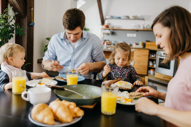 istock Family is having breakfast together 1197695699