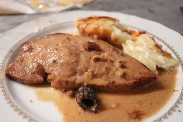 istock Roast veal with morels accompanied by gratin dauphinois 1197697963