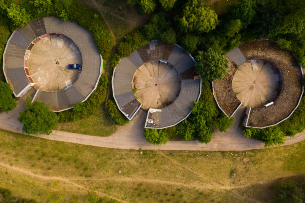 istock Drone view of old rustic garages during shaped like C summer day. 1197700482