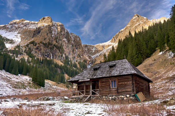 Aerial view of an old hut in the mountains during winter. Hochtannberg, Vorarlberg