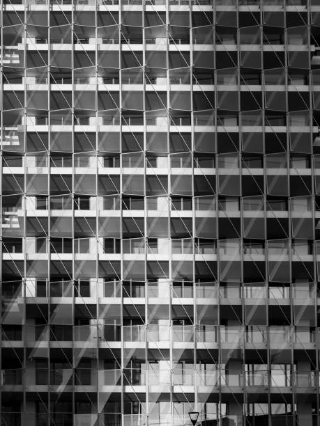 istock Urban concept. Facade of a building that repeats identical windows. 1197705868