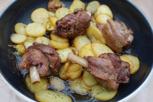 istock Confit duck legs cooked with potatoes 1197707811