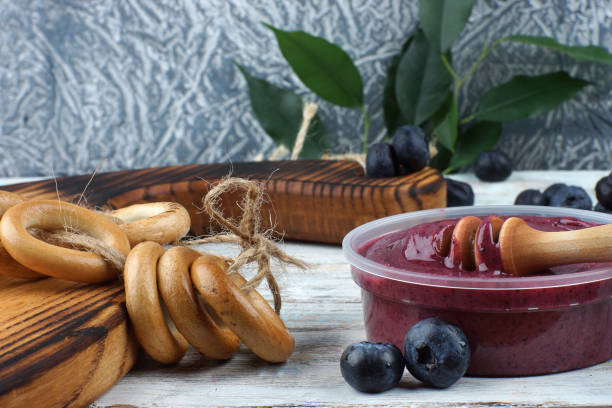 istock Whipped honey with blueberries and bagels on the table 1197707876