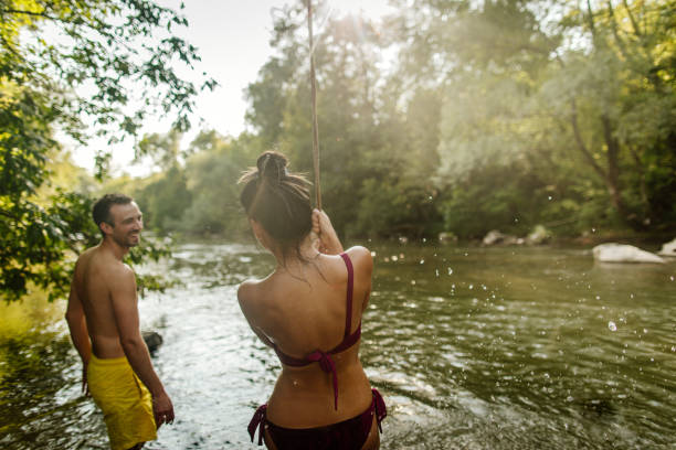 istock Liana swing on the river 1197708786