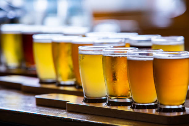 istock Flight craft beer glasses on wooden tray 1197709848