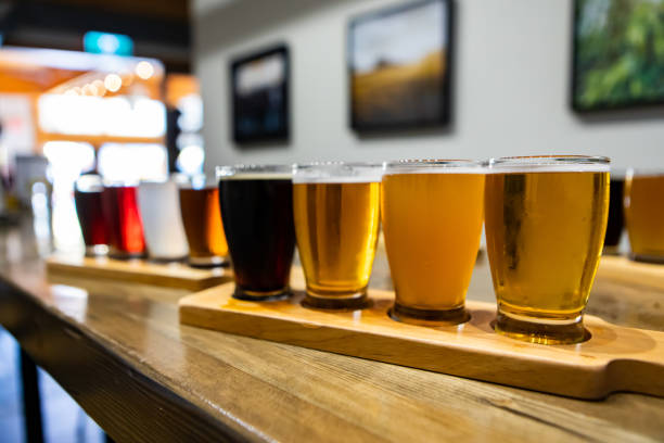 istock Flight craft beer glasses on wooden tray 1197709953
