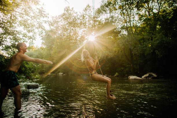 istock Liana swing on the river 1197710048