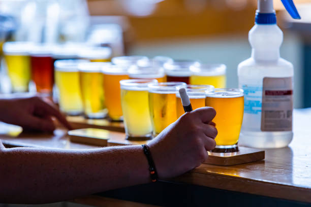pen on hand, Beers glasses wooden Tray