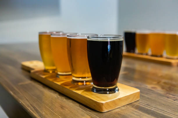 istock Flight craft beer glasses on wooden tray 1197710073