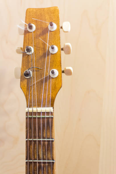 istock guitar strings and fretboard close-up 1197719684