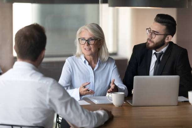 istock Diverse businesspeople talk discussing employment at office interview 1197735175