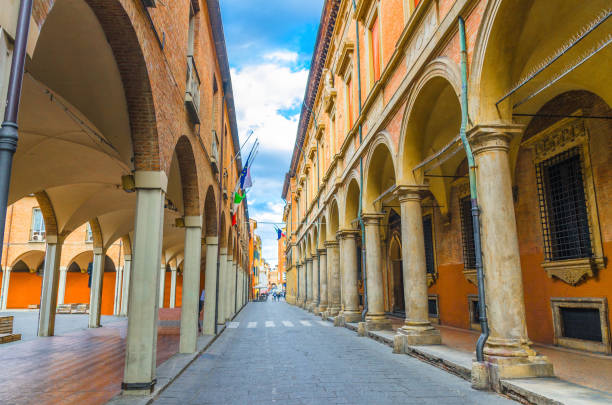 Typical italian street, buildings with columns, Palazzo Poggi museum, Since Academy and university in old historical city centre of Bologna, Emilia-Romagna, Italy stock photo