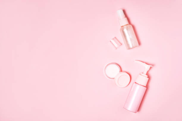 istock Cosmetic bottle containers on pink color background. 1197735888