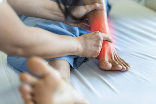 istock Ankle pain from instability, arthritis, gout, tendonitis, fracture, nerve compression (tarsal tunnel syndrome), infection and poor structural alignment of leg or foot in ageing patient with doctor 1197736042