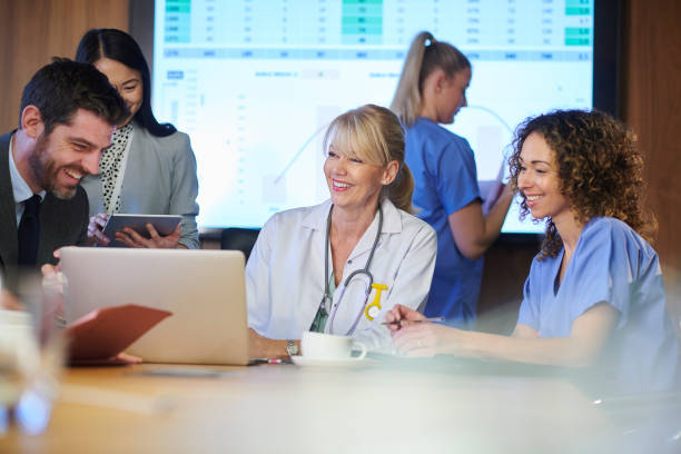 istock happy medical team meeting 1197738901