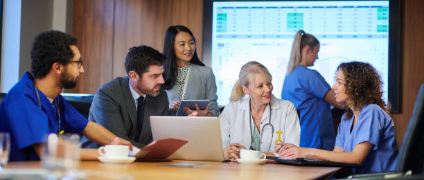 istock hospital business meeting panoramic 1197738936