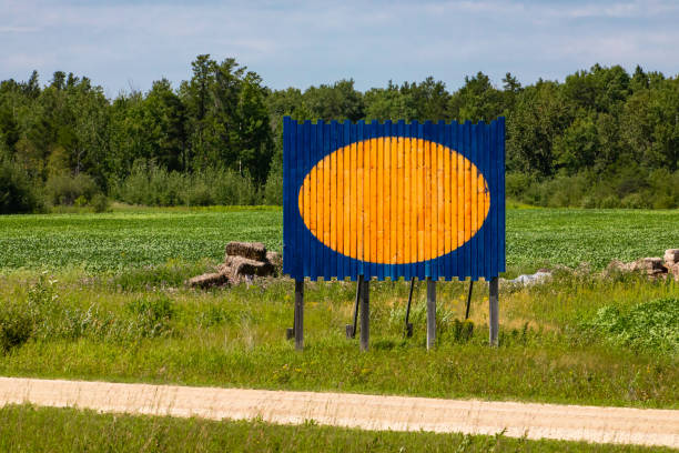 Mock up. Blank white billboard for outdoor advertising, marketing, sales against blue sky.