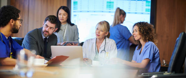 istock hospital business meeting panoramic 1197739810