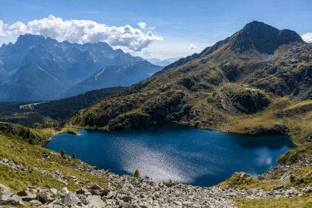 Lake Ritorto, located in the Adamello-Presanella mountain range of the European Alps (northern Italy). In the background is a part of the Brenta mountain range visible.