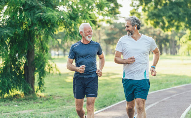 istock Senior friends jogging 1197745188