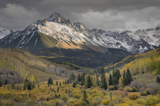 Autumn Storm over Mount Sneffels Taken late evening in the San Juan mountains near Ridgway, Colorado ridgway stock pictures, royalty-free photos & images