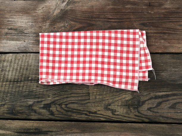 istock red-white textile kitchen towel on a wooden background from old gray boards 1197749792